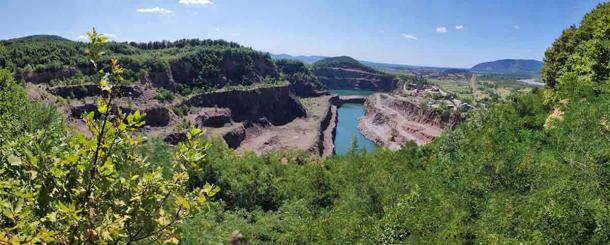 View from Gostry Verkh of Korolevo quarry with Korolevo II site (behind water body) where the Paleolithic tools were discovered. (Roman Garba / Nature)