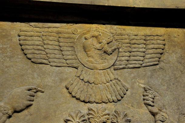 A close-up view of a wall relief depicting the God Ashur (Assur) inside a winged- disc, Nimrud, Iraq.