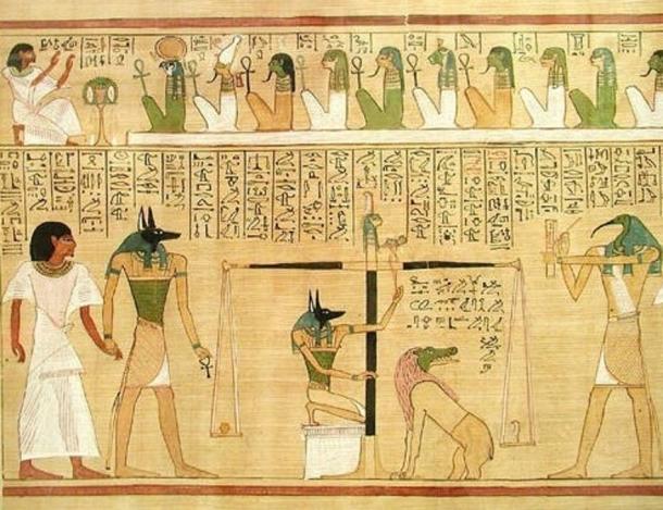 El "pesaje del corazón", del libro de los muertos de Hunefer.  Anubis es retratado guiando al difunto hacia adelante y manipulando la balanza, bajo el escrutinio de Thoth con cabeza de ibis.