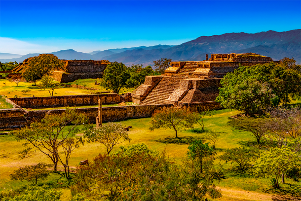 Buildings on the west side of the large, open central plaza of Monte Alban, a city that lasted for 1,300 years. (WitR / Adobe Stock)