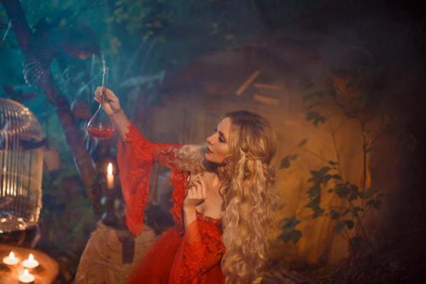 A witch creating a love potion. (kharchenkoirina /Adobe Stock)