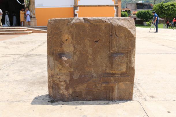 One of the wonderfully carved stone slabs found in front of the church of San Miguel Ixtapan. Unlike the other slabs, this one has two “knobs” protruding from the arms of the letter ‘T’. (Author provided)