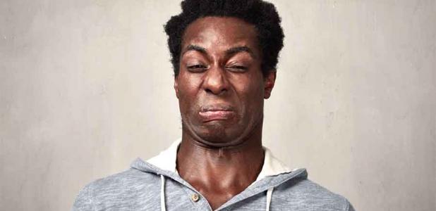 A man contorting his face at the idea of some of the weirdest foods in history. Source: Kurhan / Adobe Stock