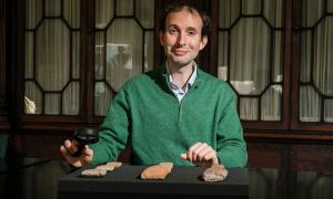 Dr. Martin Worthington, who was hired to attain authenticity in Marvel’s Eternals, in the Library of Trinity College Dublin pictured with a collection of cuneiform tablets written in ancient Babylonian language. Source: Trinity College Dublin