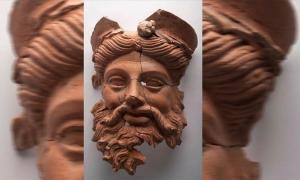 The Greek god mask of Dionysus recently unearthed in an ancient Lydian kitchen in western Turkey.               Source: Anadolu Agency
