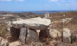 Ta’ Cenc dolmen, one of the best-preserved Megalithic dolmens in Malta, sits on the edge of the Ta' Cenc Cliffs. 