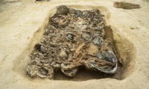 A burial pit full of grave goods. (Pierluigi Giorgi / © Antiquity Publications Ltd)