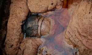 The Taizhou mummy was discovered accidentally by road workers and was found immersed in a mysterious brown liquid. Source: GU XIANGZHONG, XINHUA