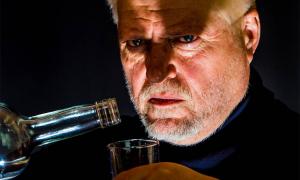 Man drinking alcohol. Credit: Rainer Fuhrmann / Adobe Stock