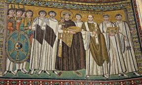 Mosaic of Emperor Justinian I and his retinue, from the Church of Sa Vitale in Ravenna, Italy. 