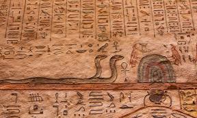 Egyptian painting of snakes near Anubis. Source: Vermeulen-Perdaen / Adobe Stock.
