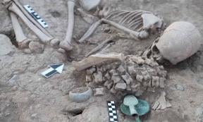 Burial of teenage girl found with 180 sheep ankle bones. Credit: Kazakh Ministry of Science and Higher Education.