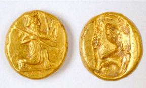 Archaeologists discovered a pot of gold Persian coins, called darics, at the ancient city of Notion in Turkey. The coins show a figure of a kneeling archer, the characteristic design of the Persian daric, a type of gold coin issued by the Persian Empire.	Source: Photo courtesy of Notion Archaeological Project, University of Michigan