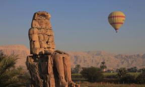 One of the iconic Colossi of Memnon statues.