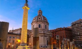 Trajan's Column and The Church of the Most Holy Name of Mary at the Trajan Forum, Rome, Italy.