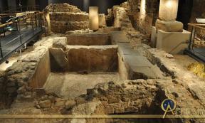 Remains of an ancient Roman salt fish factory and garum factory in the archaeological underground ruins at Plaça del Rei. 