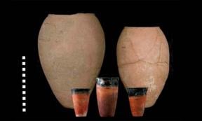 The complete large straw-tempered Egyptian beer jars from Hierakonpolis in the background. Source:  Journal of Anthropological Archaeology