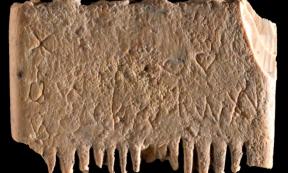 First Canaanite writing scratched onto an ivory comb. Source: Dafna Gazit/Israel Antiquities Authority