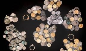 Archaeologists unearthed a cache of medieval coins at the Huqoq synagogue in northern Israel.