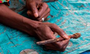 Decorating fabric in Gambia. Source:  s-aznar / Adobe Stock.