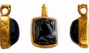 The supposedly “magical” gold pendant was discovered at Great Tey near Colchester. Source: Surrey County Council