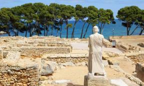 Statue and ruins at Empúries (Ampurias), Spain. 