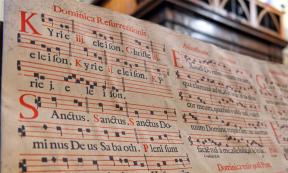 Book of Gregorian chants within a cathedral. Source: Ivan / Adobe Stock