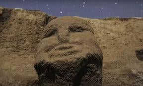 A human head in an ancient wall at the Karahantepe site in Turkey.  Source: Ancient Architects / YouTube screenshot