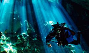 Diver in a cenote in Mexico. Public Domain.
