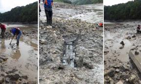 Several timbers thought to be from a fragmented Roman crossing structure for the River Wye. 	Source: Simon Maddison/CAS