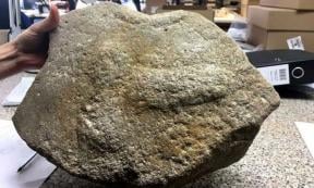 The millstone with an ancient Roman phallus engraving. Source: Highways England