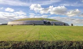 The Newgrange prehistoric monument in Ireland is a large circular mound containing a chamber