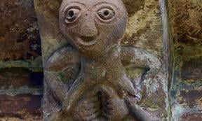 An example of a Sheela na gig, a carving of a naked woman with an exaggerated vulva. 