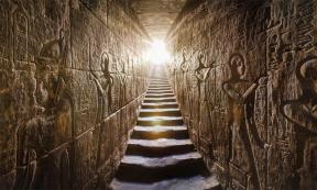 Temple of Edfu passage with glowing walls of Egyptian hieroglyphs on either side.	Source: Konstantin / AdobeStock