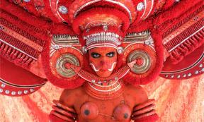 Dancer at a traditional Theyyam ceremony, India. Source: Dietmar Temps / Adobe Stock.