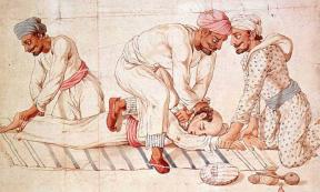 A group of Thuggees strangling a traveler on a highway in India in the early 19th century. Source: Public domain