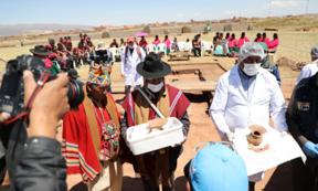 The local Aymara held a ritual before the vessels were removed.        Source: Ministerio de Culturas y Turismo de Bolivia / Facebook