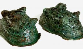 Two Viking-era brooches found in the grave with the Woman in Blue. 