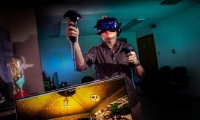 Computer science graduate student and project manager Cameron Merrill explores a virtual archaeology cave excavation experience he helped create. Source: Fred Zwicky / University of Illinois