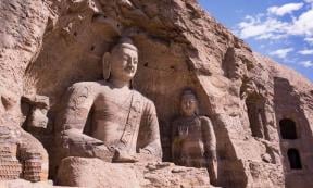The Yungang Grottoes are a UNESCO World heritage site in Datong, Shanxi province, China. Source: mijun/Adobe Stock