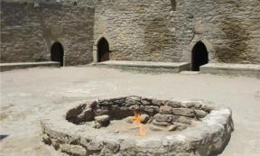 The Zoroastrian Ateshgah “Fire Temple” near Baku, Azerbaijan. The temple was built over natural burning vents which no longer provide gas, and so the flame is now artificially fed via a pipe. 