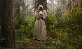 Monk in the forest Credit: Demian / Adobe Stock