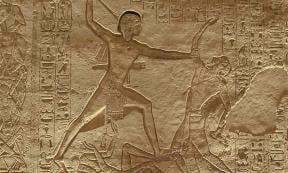 Depiction of Ramesses II slaying one enemy while trampling another, from a rock-cut relief at Abu Simbel	Source: Aoineko/CC BY-SA 3.0