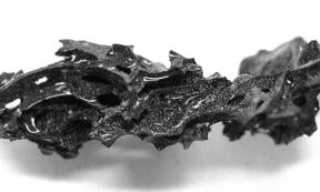 A piece of organic glass discovered within the skull of a man from ancient Herculaneum