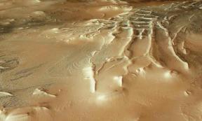 No Ziggy? The Inca City at the Martian Pole surrounded by thousands of spiders from Mars, here seen as tiny dark spots. Source: European Space Agency / CC-BY-SA 3.0.