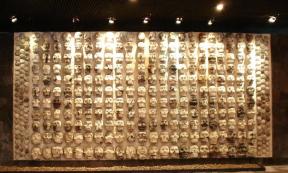 Display of wooden rack filled with skulls, used by Mesoamerican societies (including the Maya) to display the heads of sacrificial victims, at the Templo Mayor Museum in Mexico City. 