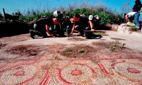 The flower mosaic at Horvat El-Bira being excavated. Source: Emil Algam/IAA