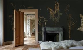  Nature-themed mural adorning a bedroom wall.