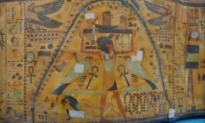 Nut’s cosmological vignette on the outer coffin of Nesitaudjatakhet. Nut’s body is covered in stars as well as a thick, undulating black curve that runs from the soles of her feet to the tips of her fingers. This curve, surrounded by stars on both sides, is reminiscent of the Milky Way’s Great Rift.
