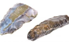 Stone axe and knife (representational). Source: JPS / Adobe Stock.